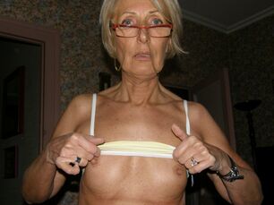 Trendy slender grandmother posing