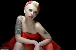 Tatted platinum-blonde Lynn Blows a