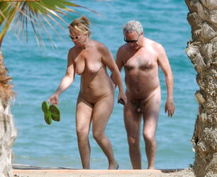 Nudists family bare beach -